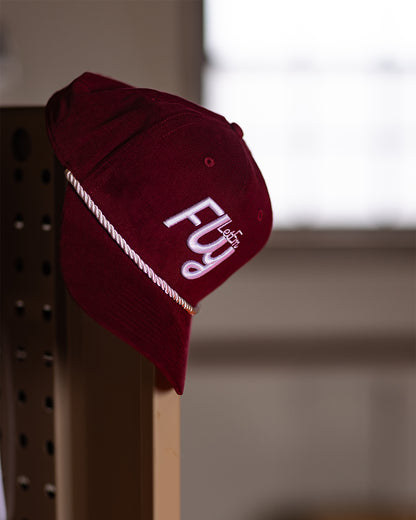 Red Feather and Hide golf hat made of corduroy