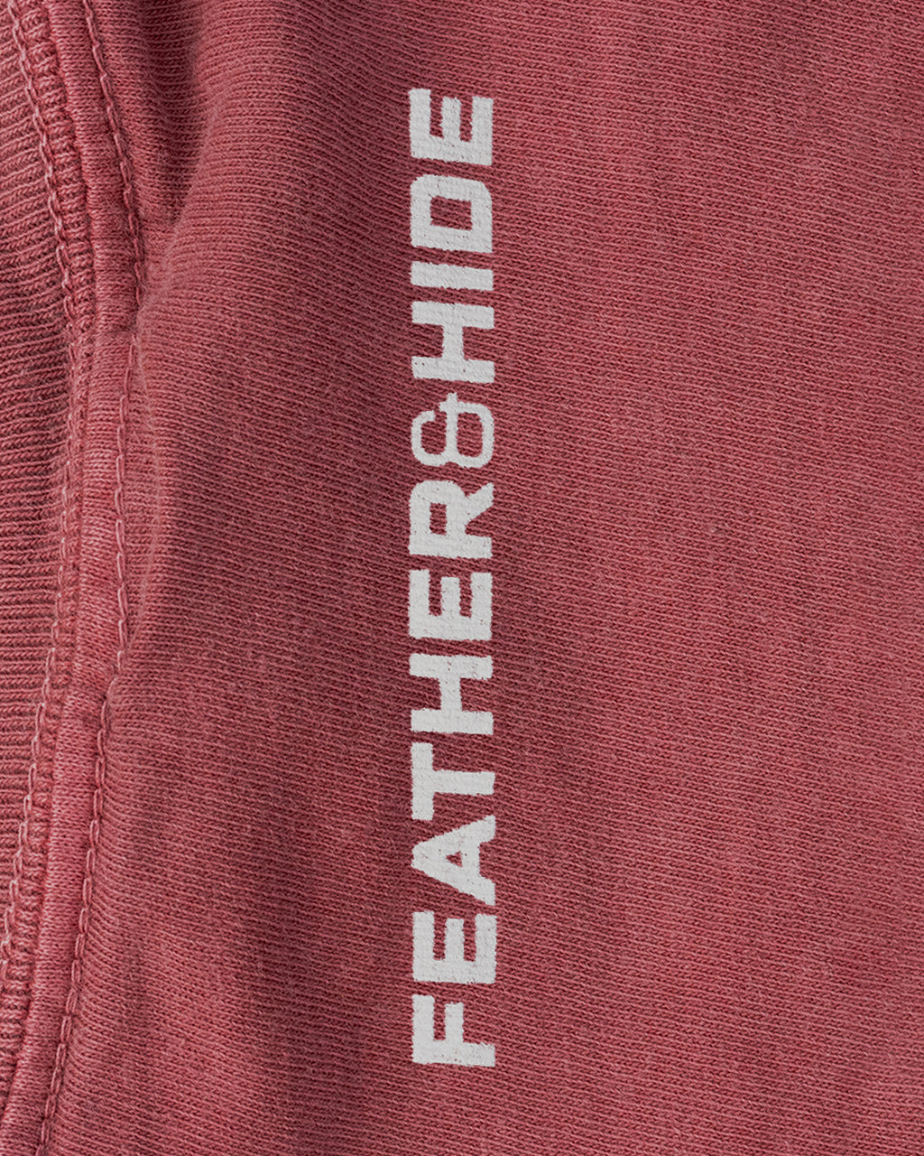 Feather and Hide on a red tshirt