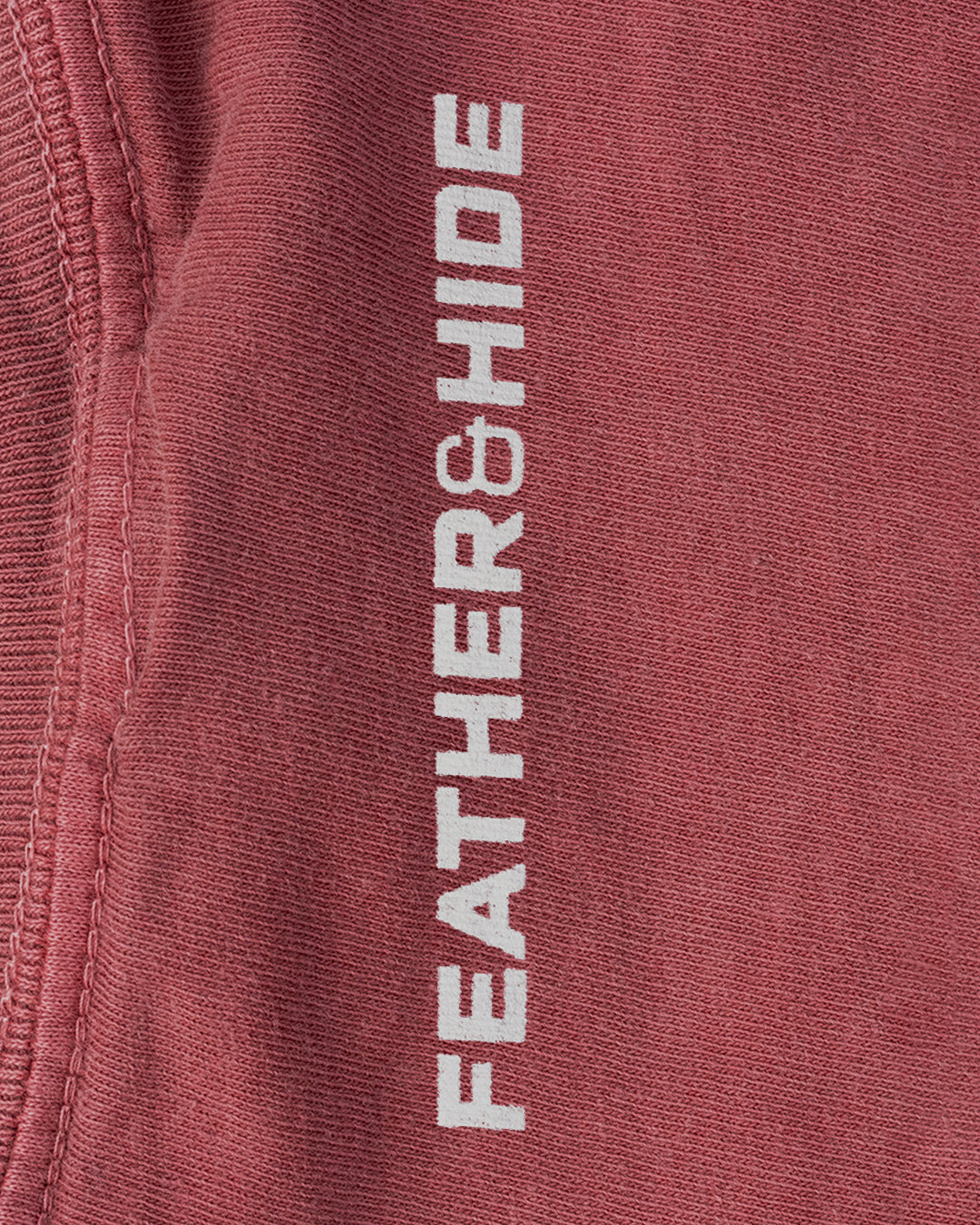 Feather and Hide on a red tshirt