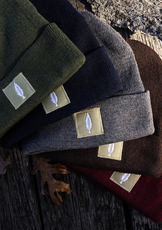 Feather and hide golf beanies