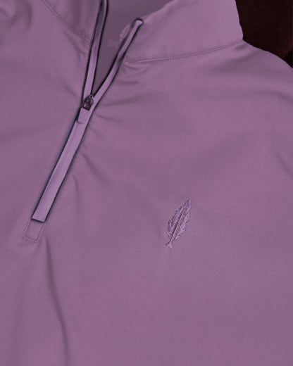 Feather and Hide logo on a golf quarter zip