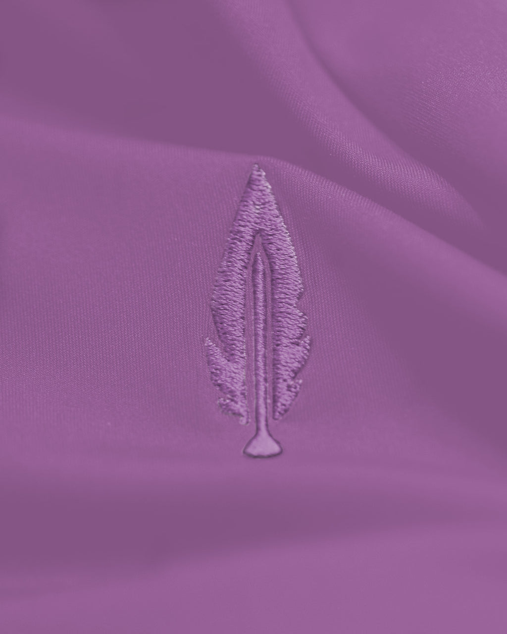 lavender feather and hide golf logo